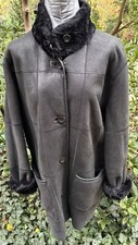 Lammfell Kurzmantel.  Damen Größe 44. Schwarz. Von Christ. Schön warm