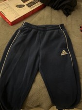 Niebieskie spodnie dresowe addidas