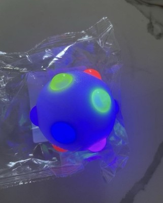 Rainbow glow in the dark squishy ball - when you bounce it lights up - #squishy#