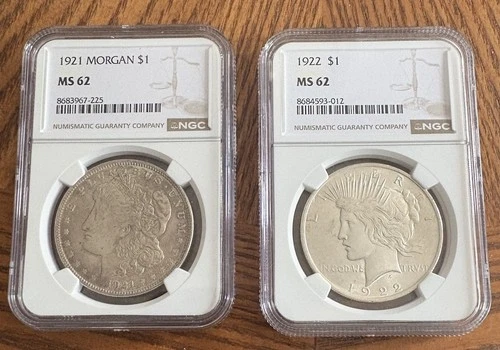 1922 Peace and 1921 Morgan Dollar silver coins and bullion. NCG MS 62
