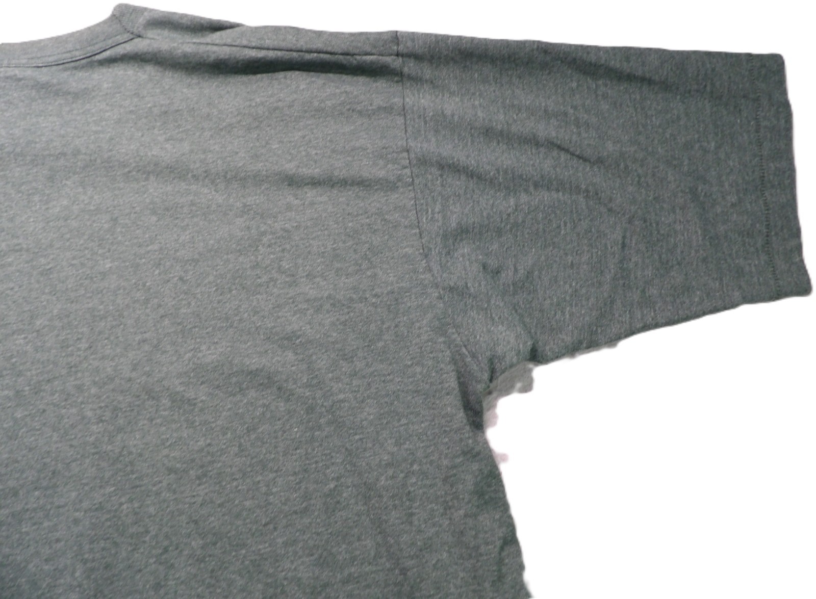 Gray VTG men’s shirt XLT with short sleeves, shown close-up with a straight hem stitch on a white background.