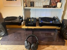 Pioneer PLX 1000 turntables, DJM 250 mixer, headphones, pair of DM50 monitors