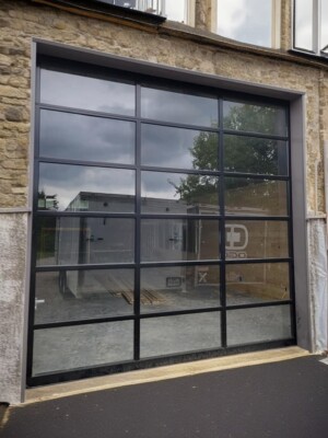 Full View Garage Door 12 ft By 12 ft Anodized Matt Black Frame With Clear Glass