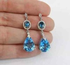4Ct Pear Cut Lab-Created Blue Topaz Drop/Dangle Earring In 14k White Gold Plated