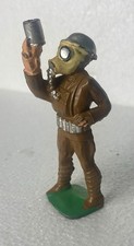 Manoil Soldier With Gas Mask Flare Pistol. M94/63.