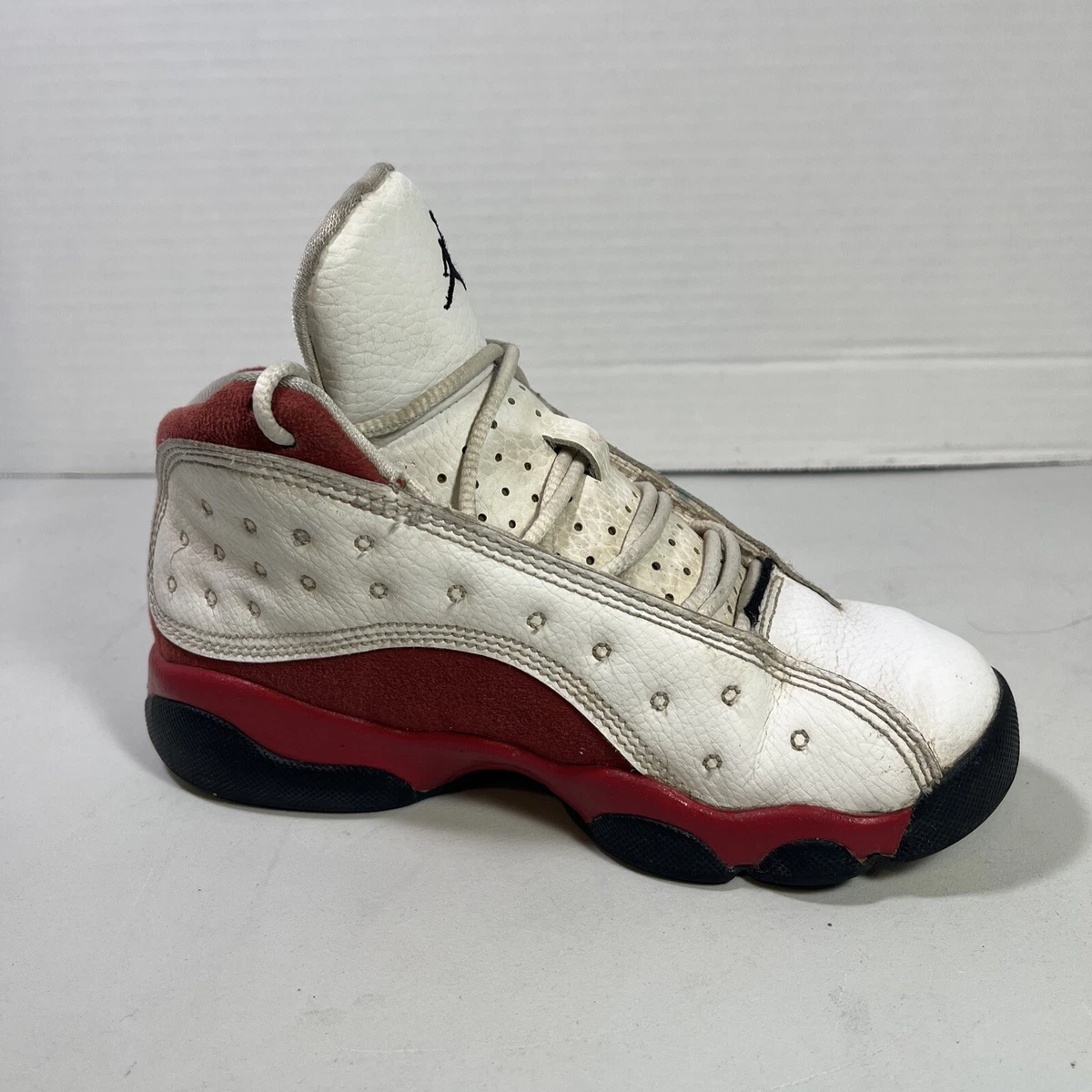 White and red best sale jordan retro 13