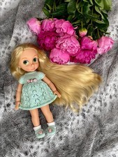 Handgestricktes Kleid mit Schühchen für Dis...