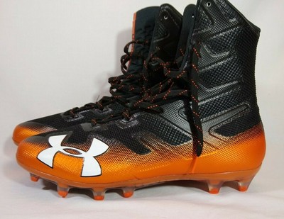 orange and black under armour football cleats