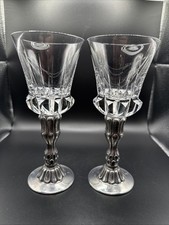 A Pair Of Pewter Stem And Crystal Top Champagne Ware