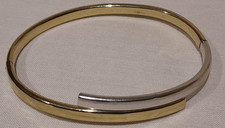 *9ct White & Yellow Gold 'Stylish Geometric Hinged' 7" Oval Bangle. 5.80 grams*