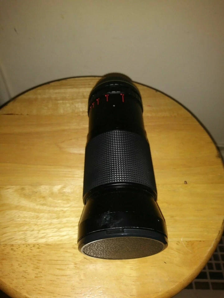 Lente zoom cámara automática Sakar MC macro 1:3,5-4,8 f=35-200 mm telescopio binoculares Foto 3 de 4