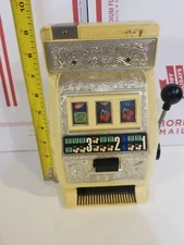 1972 Ten cents toy. SLOT MACHINE. Made in Japan.  Poynter products. Vegas banker