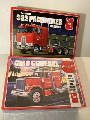 2 AMT 1/25 Peterbilt 352 Pacemaker (Open) & GMC General Truck Tractor (Sealed)