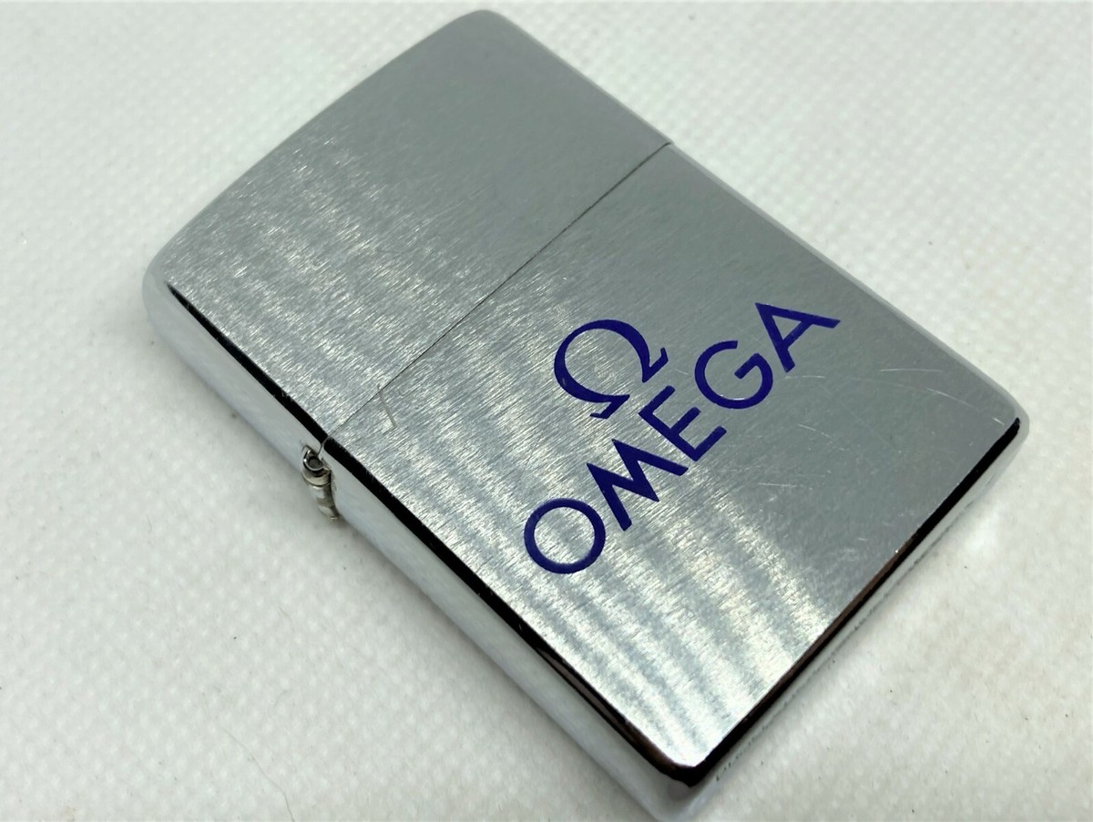 Rare Auth ZIPPO 2000 OMEGA Watch Logo Novelty Lighter Silver