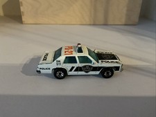 Matchbox International 51 Ford Ltd. Police Car white & black, chrome base.