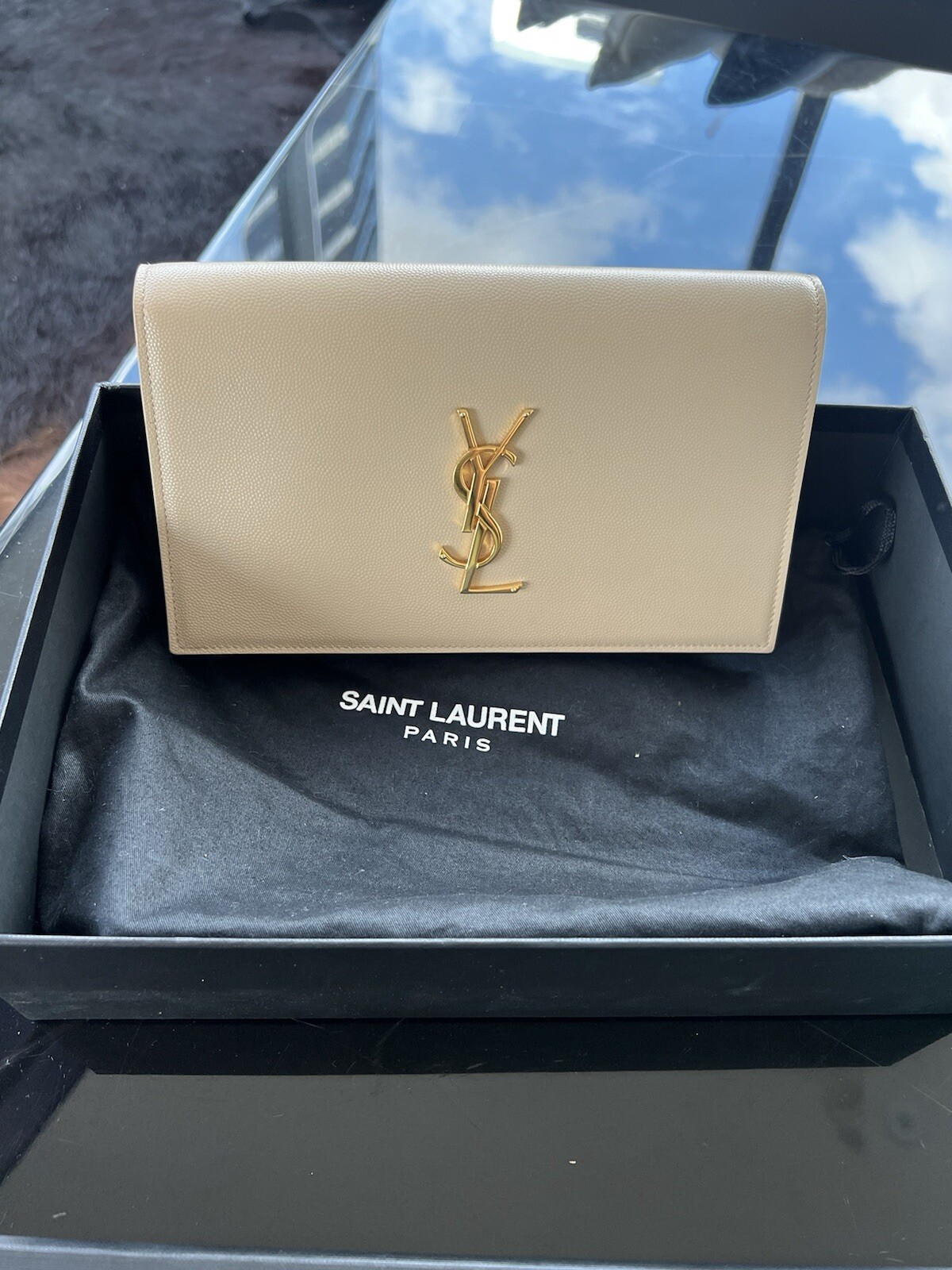 Pochette Saint Laurent YSL in pelle beige