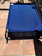 Comfortable raised dog bed medium hardly used sturdy