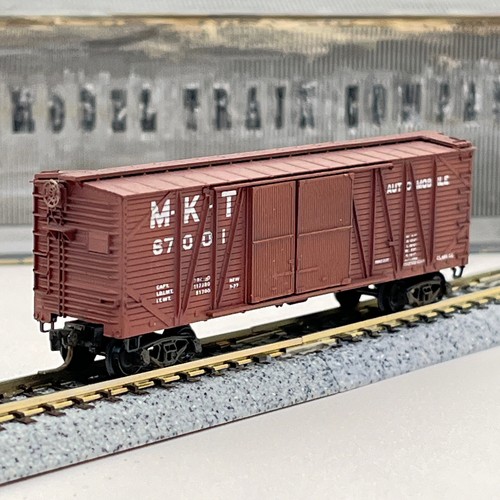 Coche de carga Micro-Trains escala N Missouri Kansas TX soporte exterior madera 67001 desgastado | Zustand: Used