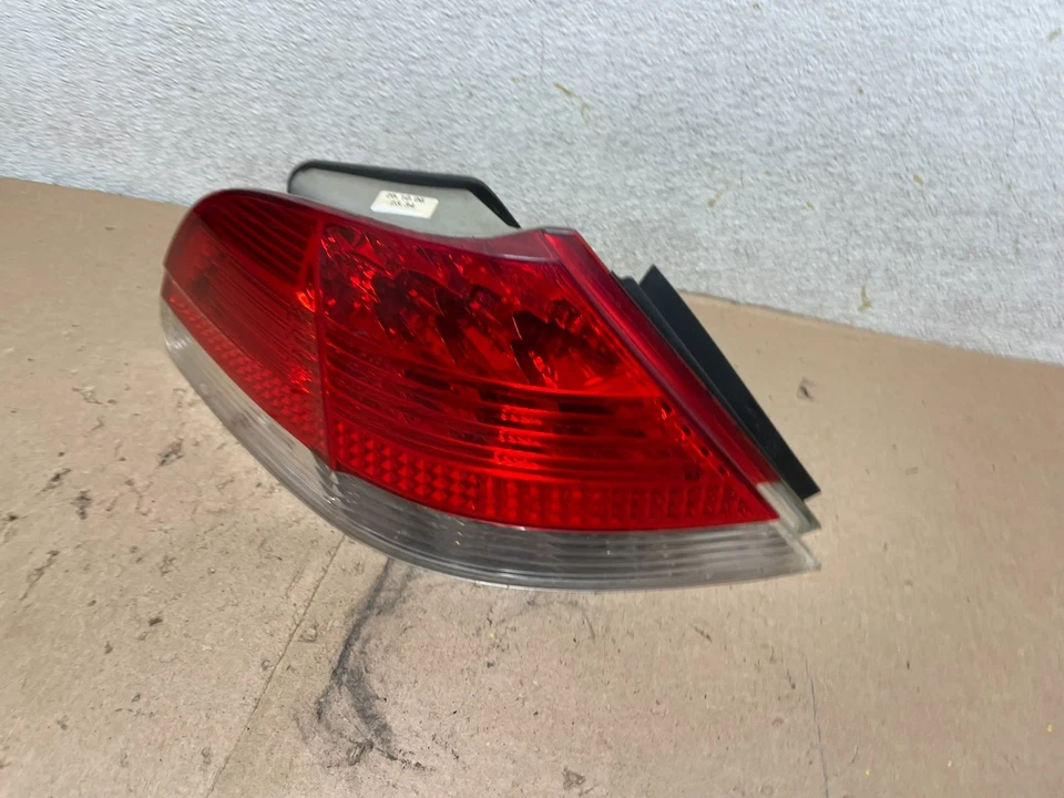 Lanterna traseira esquerda do motorista 2006 2007 2008 BMW 7-Series 750li 760li fabricante de equipamento original Q4865 DW - Imagem 2 de 4
