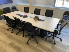 Modern Conference Table with 9 chairs and power cut outs