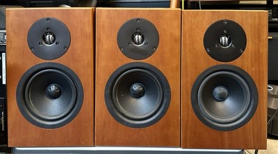 A set of three Linn Tukan bookshelf speakers