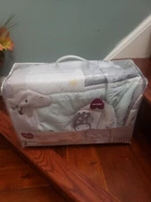 Parents Choice 3pc nursery set crib, comforter, fitted sheet and dust.  NewParen