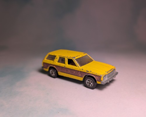 Hot Wheels Vintage 1981 Aries Wagon Yellow w/ Wood Panel Trim (Loose 1:64 Scale)