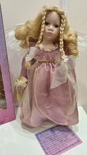 Porcelain Doll "Faith" 42 cm by Leonardo Collection.