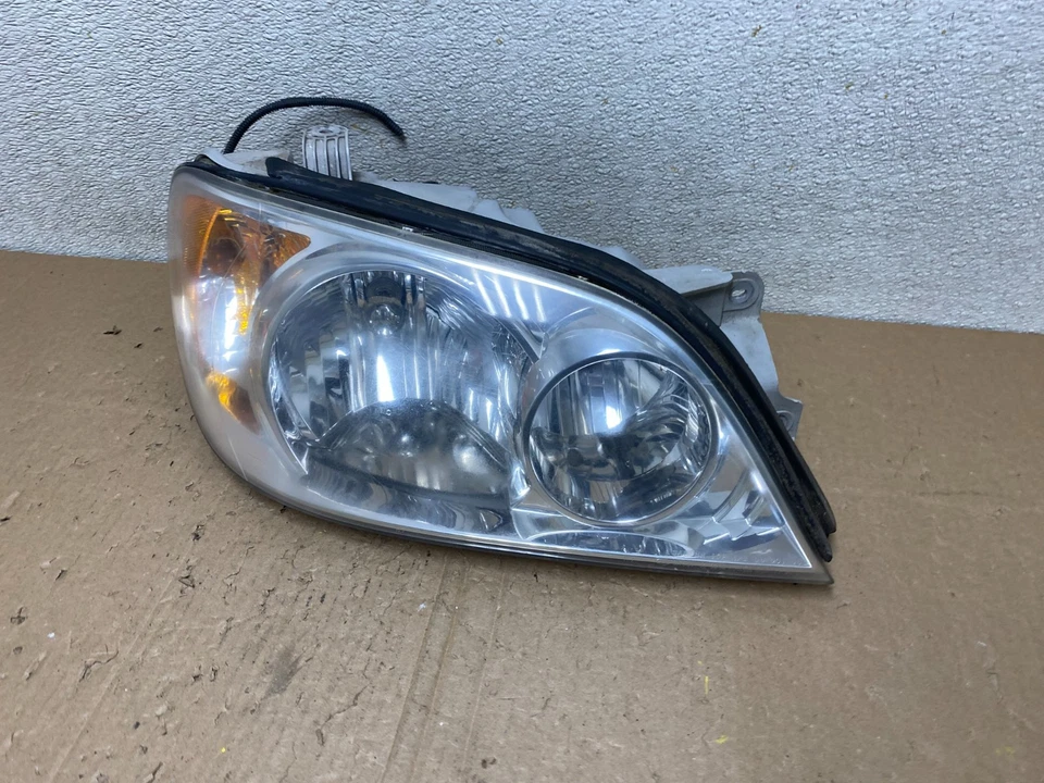 Faro lateral derecho pasajero Kia Sedona 2002 a 2005 OEM U0375 DW Foto 2 de 4