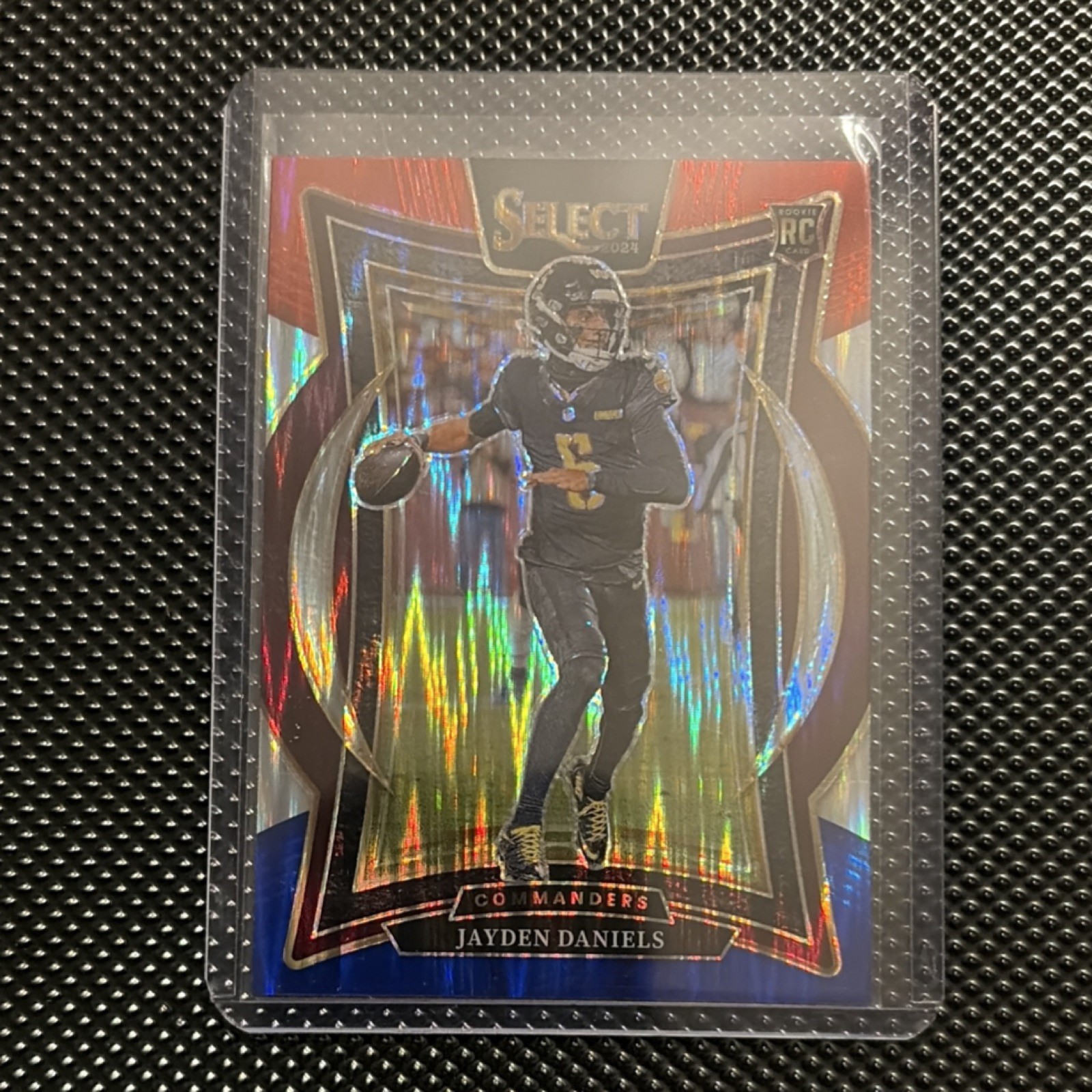 2024 Panini Select Red & Blue Shock Prizm Jayden Daniels Rookie #26 Commanders