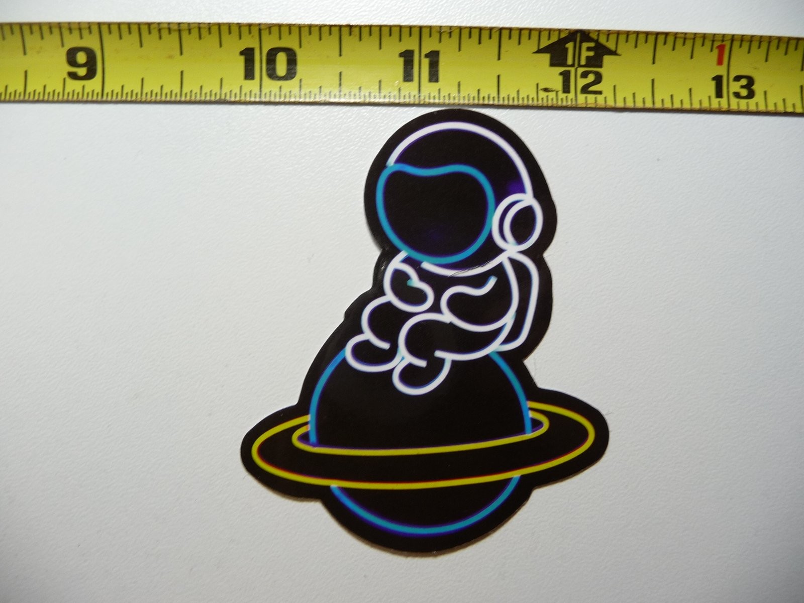Astronaut Riding Saturn Neon Sticker Decal Colorful Fun Space Art  