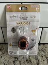 Harry Potter Tamagotchi Magical Creatures Electronic Game Red NEW Sealed