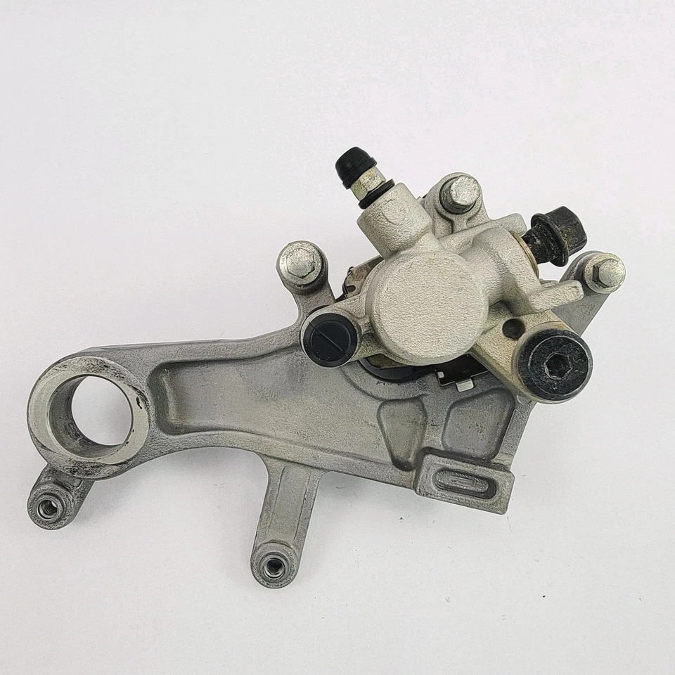 Pinza de freno trasera Honda CRF250R CRF450R 250X 450X 2011 05-17 buen soporte pastillas Foto 3 de 4