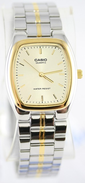 silver and gold casio watch