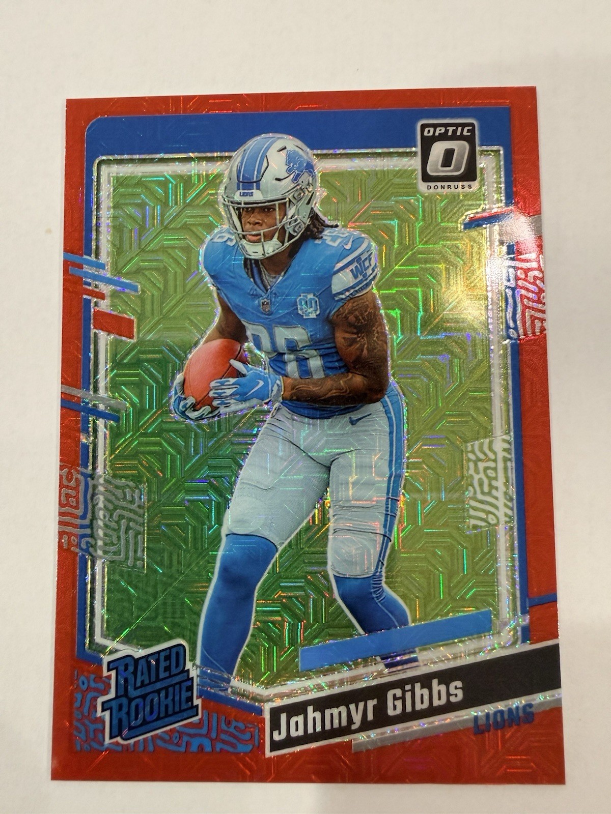 2023 Panini Donruss Optic - Rated Rookie Jahmyr Gibbs #236 Red Mojo Prizm (RC)