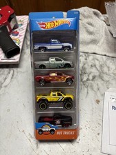 Hot Wheels 5-pack Hot trucks with '83 Chevy Silverado  Ships securely 