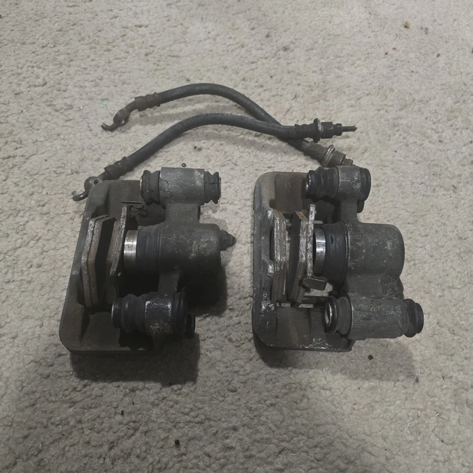 00-05 Pinzas de freno de disco traseras izquierda y derecha Toyota CELICA con pastillas y manguera Foto 2 de 4