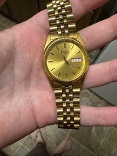 Seiko Men s Quartz Gold Tone Day/Date 25mm Wa...