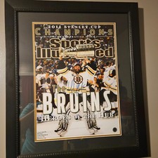 Tim Thomas signed Sports Illustrated cover.  15x20. Very good condition 