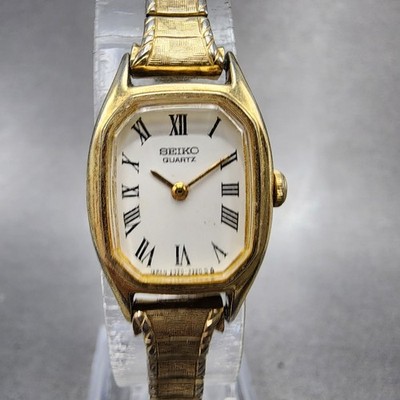 Seiko Tank Watch Women 17mm White Dial Gold Tone 2320-6559 Roman