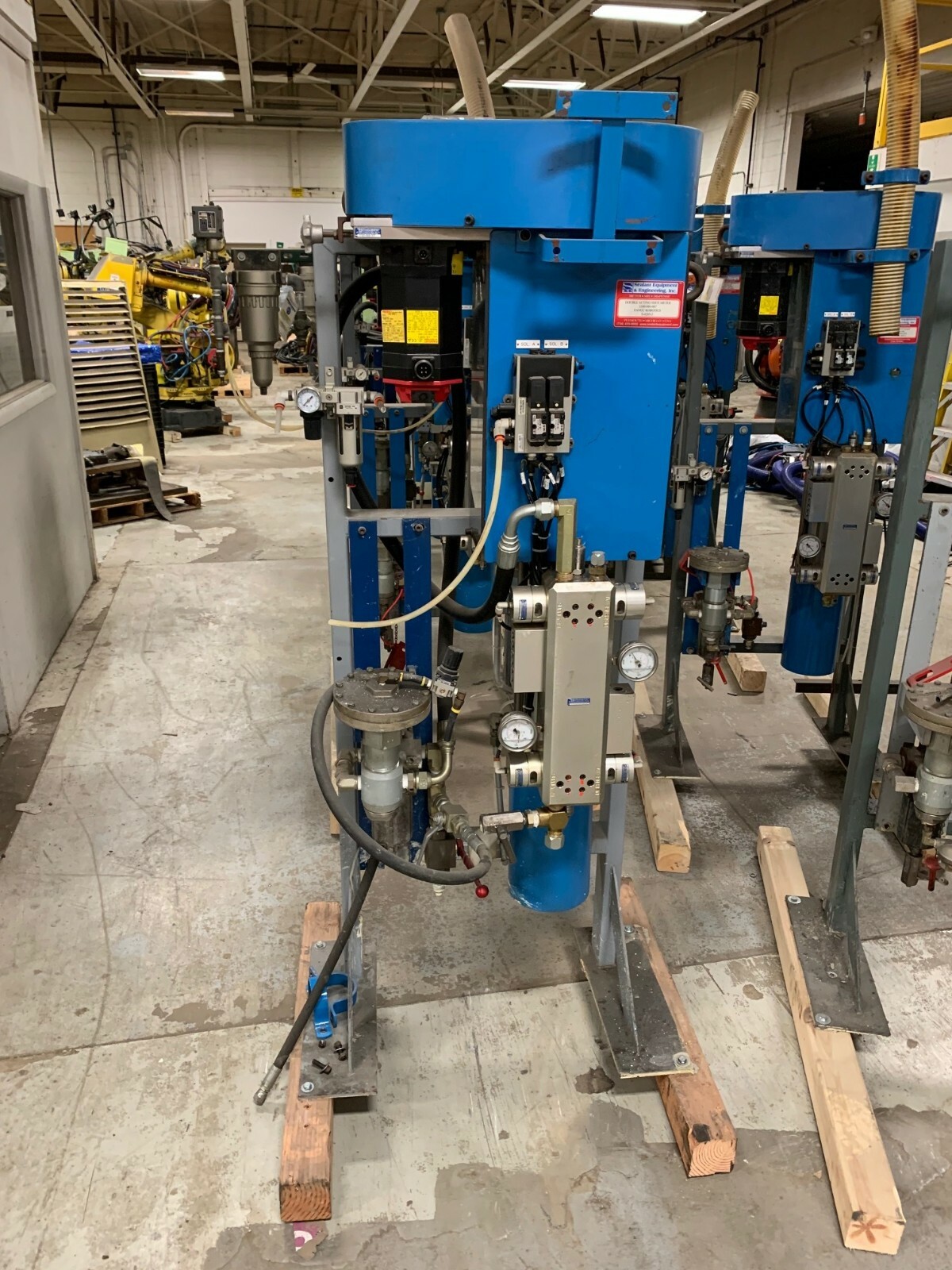 SEALANT EQUIPMENT & ENGINEERING SERVO DRIVEN ROBOTIC SEALANT APPLICATOR