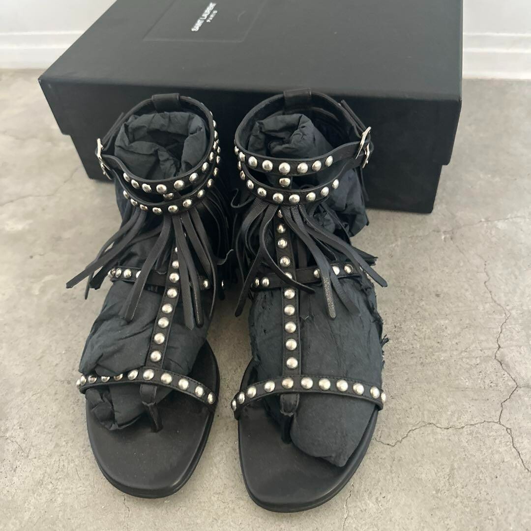 Sandali piatti gladiatore YSL Saint Laurent borchie frange pelle nera taglia 36 US6