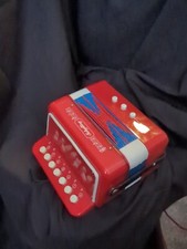 The Schylling Little Red Accordion 7.5" child's beginner level accordion