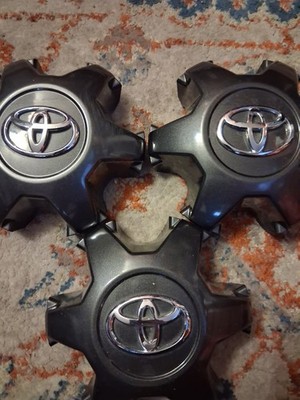 Lot Of (3) 2016-2022 Toyota Tacoma O.E.M. Charcoal Center Wheel Caps Pre-Owned