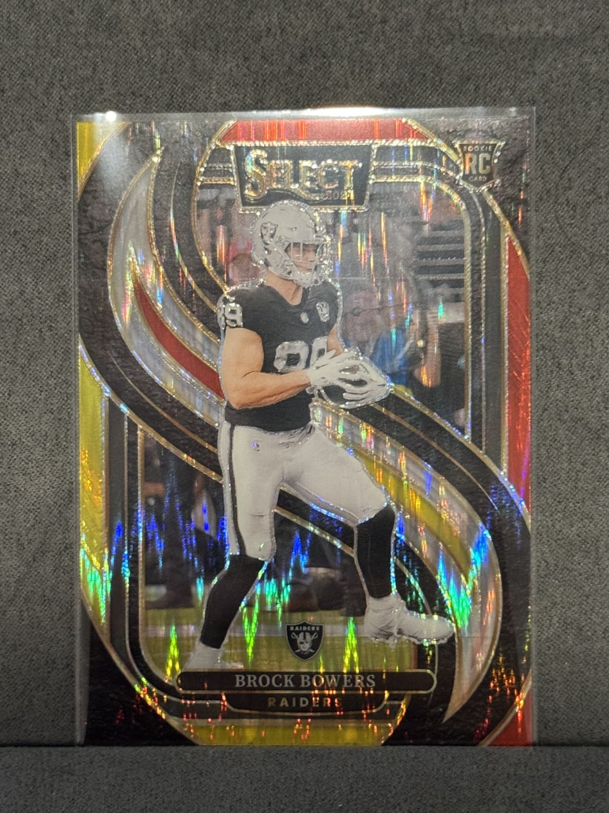 2024 Select Brock Bowers Premier RC Red and Yellow Prizm Shock #118