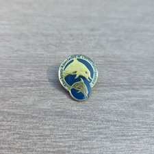 Enamel lapel badge. the logo forThe Jersey Association of Carers Incorporated.