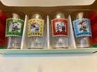 Snoopy Peanuts Set Of Four Pint Glasses Christmas Winter Theme Holiday Stamp NIB — photo 1