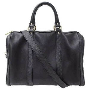 Sac bandoulière Gucci en cuir noir avec accessoires occasion mais élégant