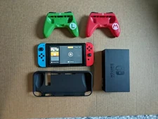 Nintendo Switch (Red & Blue Joy-Con) + PDP Mario Comfort Grip & Case - No Power 