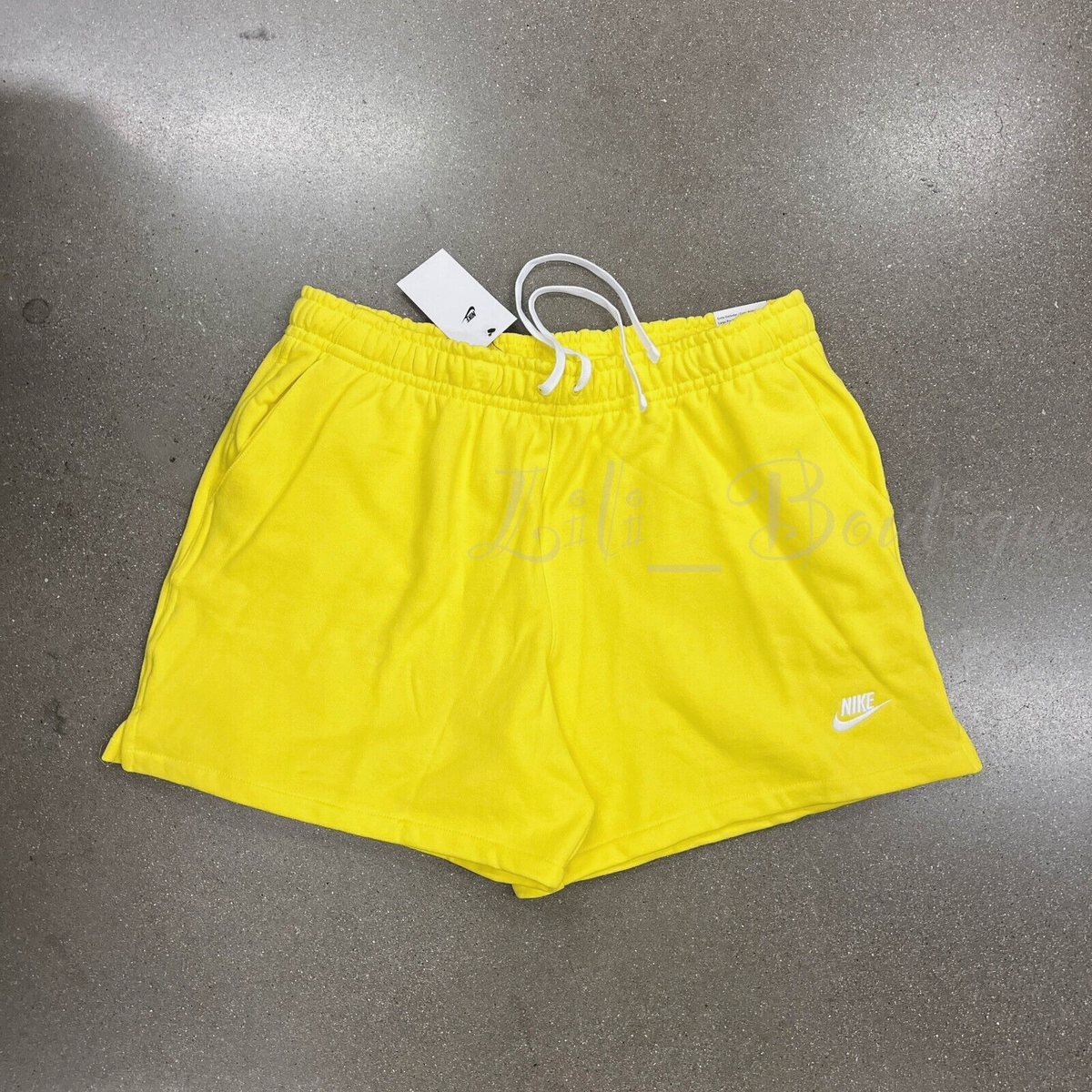 nike club woven shorts in yellow